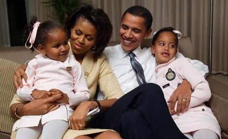barack obama family. Barack Obama is giving his